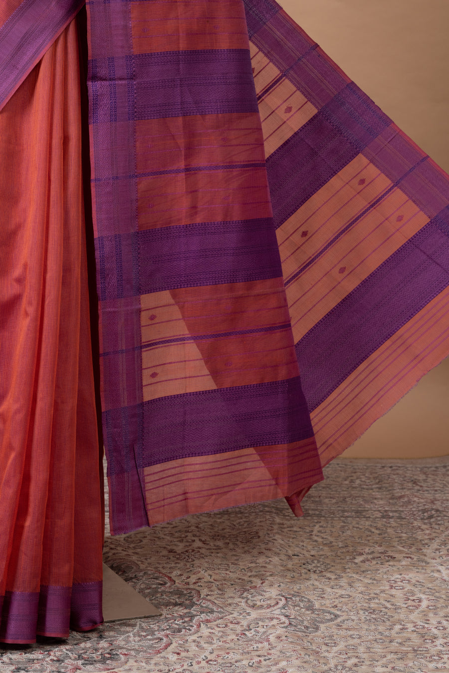 Vasanti Maheswari with purple thread border